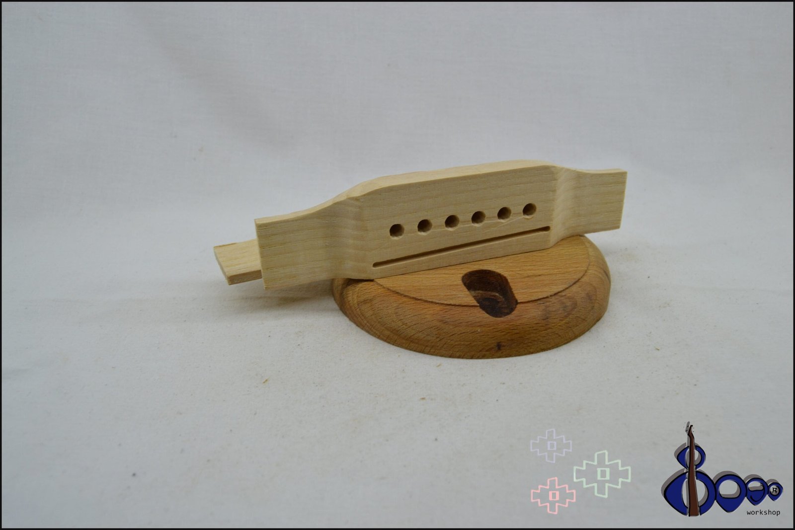 Western acoustic guitar bridge